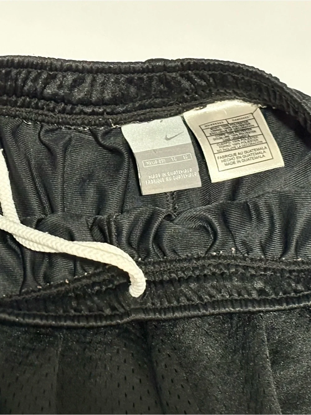 Nike Black Athletic Basketball Shorts with White Swoosh